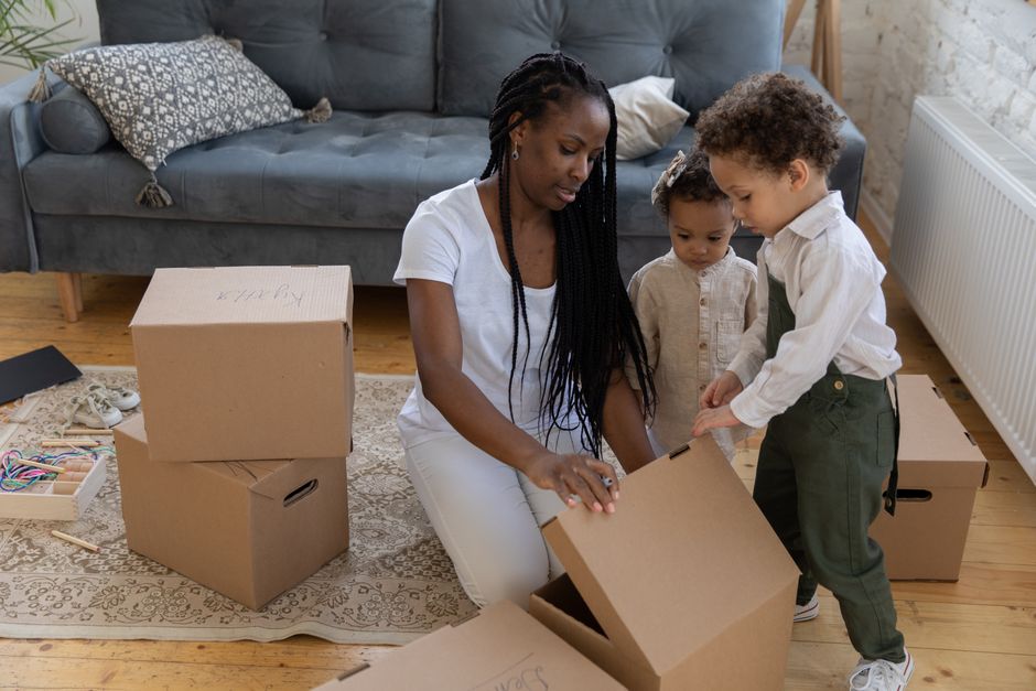 children playing cardboard box