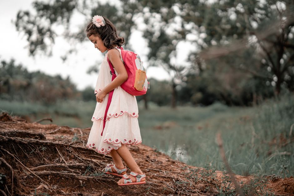 cautious child exploring outdoors
