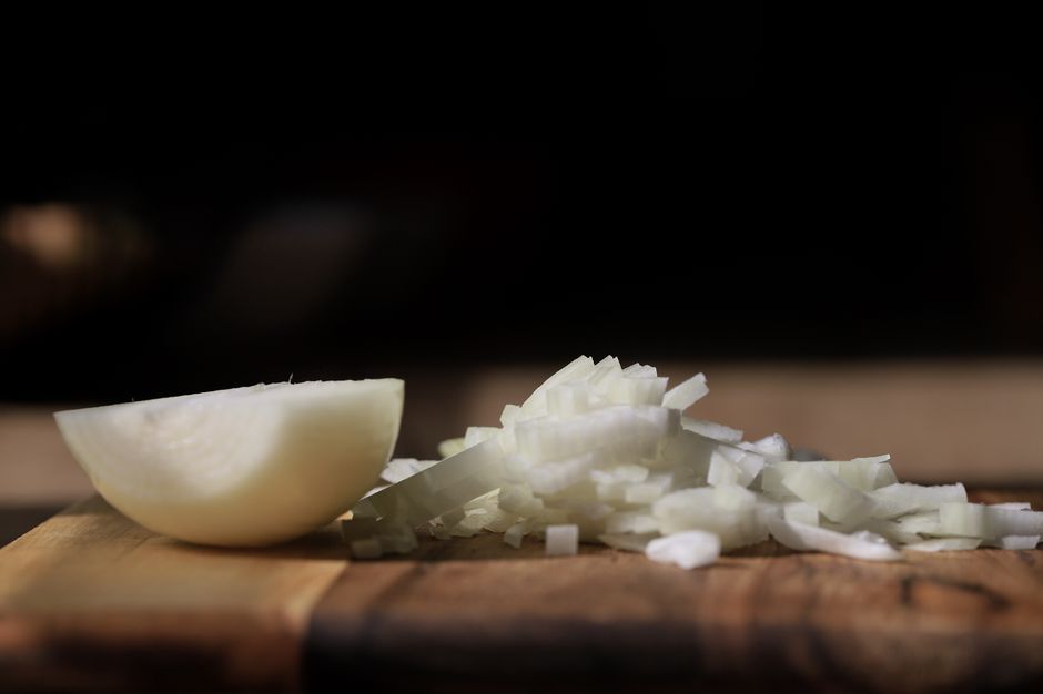onion sliced on cutting board