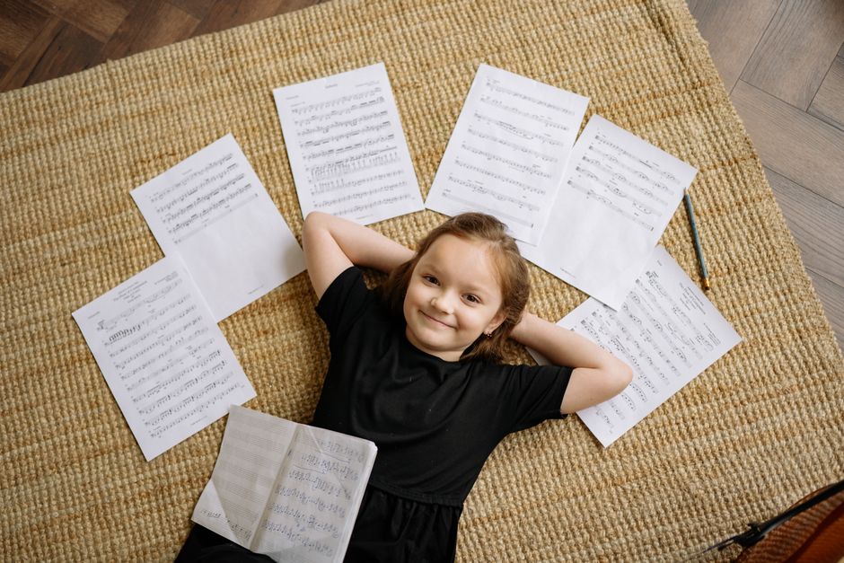 child humming music notes